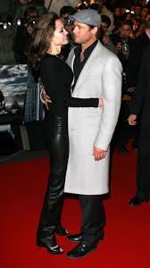 What is 'mr & mrs smith' about? Brad Pitt And Angeline Jolie S Cutest Moments Cute Photos Of Brad Pitt And Angelina Jolie