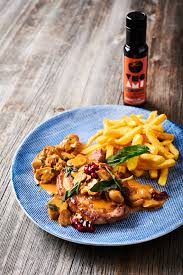 For anyone unfamiliar with schnitzel, they're made by pounding boneless pork chops very thin, breading them in flour, egg and breadcrumbs and frying. Pork Schnitzels With Cream Of Mushroom Sauce Tomami Eu