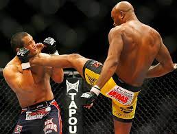 This fight was career highlight of silva in single fight. Anderson Silva R Lands A Front Kick To The Throat Of Dan Henderson L During Their Ufc Middleweight Championship Bout Pho Ufc Fighters Ufc Fight Night Ufc