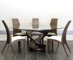 19 Magnificent Modern Dining Tables You Need To See Right Now Modern Dining Table Dining Table Chairs Unique Dining Tables