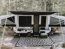 Camping in a pop up camper. Setting Up And Using Our Pop Up Camper Pop Up Camping Rain Pine Pop Up Camper Jayco Pop Up Campers Camper Makeover