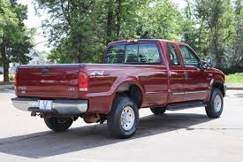 Image result for Dark Toreador Red 2000 F250