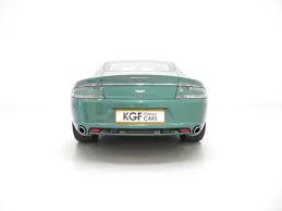 Image result for Almond Green 2010 Aston Martin