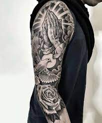 This design looks just as beautiful as the other similar designs! 101 Cool Tattoos For Men Best Tattoo Ideas Designs For Guys 2021 Christian Sleeve Tattoo Cool Arm Tattoos Arm Tattoos For Guys