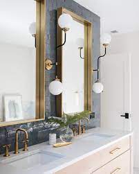 Behold 10 Next Level Bathroom Lighting Ideas To Upgrade Your Space Hunker Bathroom Lighting Contemporary Bathroom Lighting Bathroom Light Fixtures