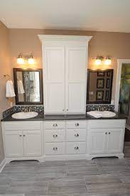 Cabinet is not only functional. Linen Cabinet On Master Bathroom Vanity I Think This Linen Cabinet Over Powers Due To It S Size I Bathroom Vanity White Bathroom Decor Master Bathroom Vanity