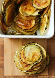 Of crushed tomatoes and fresh herbs, before finishing with a sprinkle of real parmesan. Easy Oven Baked Zucchini Chips Healthy Baked Zucchini Chips