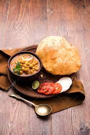 No need to register, buy now! Chole Bhature Or Chick Pea Curry And Fried Puri Served In Terracotta Stock Photo Picture And Royalty Free Image Image 102977251
