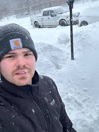 Radar helping me with the chickens and posing below Pryor Mountain after  our first good dusting of snow this year