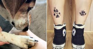 The tattoo got small paw print and heart connected with the infinity symbol. 75 Heart Melting Dog Print Tattoos