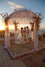 Us Virgin Islands Destination Wedding Romantic Beach Front Wedding Under A Flower Decorated Pavili Sunset Beach Weddings Wedding Beach Ceremony Beach Wedding