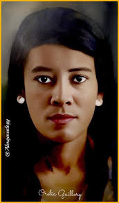 This belle femme Creole is Orelia Guillory, daughter of Alexandre Onesime  Guillory and Carliste Guillory, both born free people of color of Mallet,  Louisiana. She bears a striking resemblance to Alicia Keys.