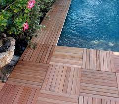 teak wood interlocking deck tiles installed around pool outdoor flooring building a deck deck tiles