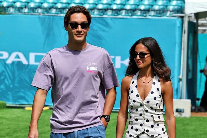 Russell labelled as "husband material" in new photos with girlfriend Carmen