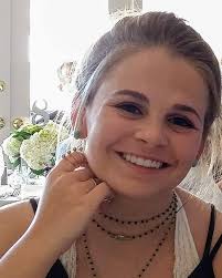 Tania Smith '15, '25M has always been driven by a passion for helping  others and creating positive change. Her time at UNCW offered her  opportunities to make a meaningful impact. From working