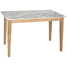 White round dining table with 4 pink velvet dining chairs. Kitchen Tables Our Pick Of The Best Ideal Home