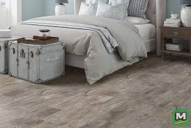 Mohawk Home Expressions Cool Gray Vinyl Plank Flooring Adds A Contemporary Touch To Any Home Easy To Install It S Grey Vinyl Plank Flooring Vinyl Plank Home