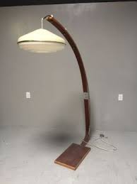 The carbon arc lamp led to other arc discharge lamps like the mercury vapor, sodium and carbon arc lamp: Vintage Arc Lamp With Teak Wood With Expanding Arm Scout Design Stud Lamp Vintage Lamps Arc Lamp