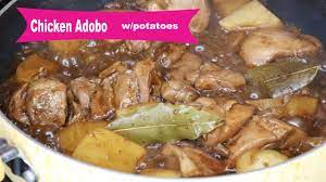 Add the soy sauce and simmer until the chicken meat is brownish bright in color. Filipino S Famous Chicken Adobo W Potatoes Recipe Youtube