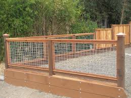 Veranda is typically made to use glass as an infill, but here wild hog was installed into the slots instead. Hog Wire Fence Gallery Guys Fencing
