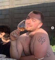 Their new arm inking appears to. Sam Smith Is Getting A New Arm Tattoo Related To Their Gender Identity