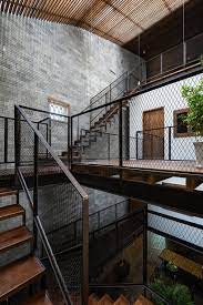 h a gives vietnamese zen house an air of monastery casa zen cocina industrial diseno de interiores moderno