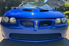 Image result for Dark Ming Blue 2004 Pontiac