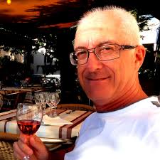 What is the identity of the car in the old motor racing photograph from  Tasmania?