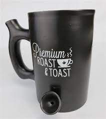 The Lazydaze Cafe Now Offers A Mug That Fits Perfectly Into The Hands Of It S Counterculture Coffee Drinkers Wake And Bake 10 Mugs Coffee Mugs Infused Coffee