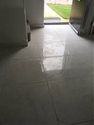 If you are cleaning a shower, you can save yourself a lot of time by simply running the shower water on your walls, but you will still need to rinse the spots that your shower cannot reach by hand. Epoxy Grout Haze Removed From New Porcelain Floor In Telford New Build Shropshire Tile Doctor