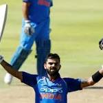 presents Virat Kohli with Test