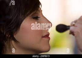 Carol Ann Lightfoot has glitter makeup applied as she gets ready for her  Quinceanera at Disneyland in Anaheim, Calif., Thursday, April 24, 2008.  Fifteen young ladies from the United States and Puerto Rico celebrated  their Quinceaneras at Disneyland ...