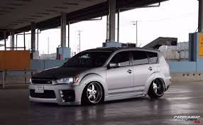 Mitsubishi outlander красный 2.0 турбо. Tuning Mitsubishi Outlander 2012