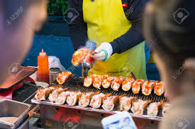 Burning Lobster In Korean Street Food Myeongdong Night Market Stock Photo Picture And Royalty Free Image Image 79397908 But there is some shop. burning lobster in korean street food myeongdong night market