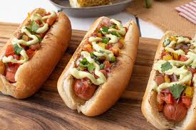 Stir in the baked beans and sliced frankfurters. Mexican Style Hot Dogs