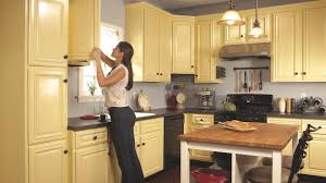 My husband is a general manager for a local home restoration firm and works with this company quite frequently. How To Spray Paint Kitchen Cabinets Diy Family Handyman