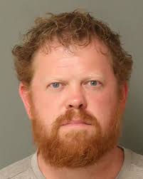 Man Arrested After Zip-Tying a Ring Camera Under a Woman's Desk to Spy