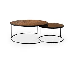 Its textured bronze surface provides a fine visual effect and a color that looks beautiful in sun, so the piece performs great as an outdoor accessory. Nesting Bronze Copper Coffee Table Set Of 2 Architonic