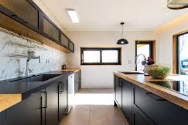 A modern kitchen designed by kodu design that features a glass backsplash, wood shelf and an integrated dining table to save space. 65 Modern Kitchen Design Ideas Photos Home Stratosphere