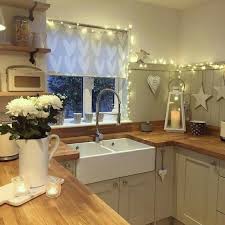 Check your local code before doing this; 25 Awesome Ways To Use String Lights In Kitchens Digsdigs