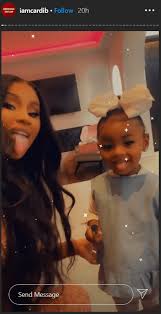 The rapper, 25, shared the news on instagram alongside a photo of herself heavily pregnant and surrounded by flowers. Cardi B Poses With Her Mini Me Daughter Kulture In An Adorable New Snap See Their Wacky Faces