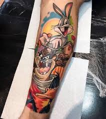 Some tattoo designs in this category you will see will be anything with a guns of all. 60 Looney Tunes Tattoos For Men Tattoosformensleeve Cartoon Tattoos Tattoos For Guys Disney Tattoos For Men