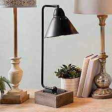 Please note that takealot relies on the relevant brand to provide us with accurate featured content for this product. Louis Matte Black Metal And Wood Table Lamp Kirklands
