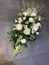 Maybe you would like to learn more about one of these? Funeral Spray Irene S Florist
