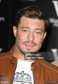 Duncan James from boy band Blue signing copies of the bands new book...  News Photo