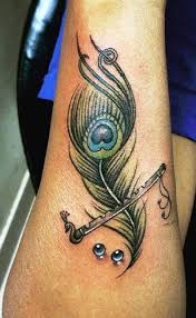 Om Tattoos Studio On Twitter Om Tattoo Krishna Tattoo Flute Tattoo
