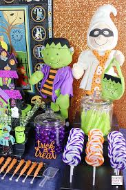 How To Setup A Trick Or Treat Halloween Candy Table Halloween Buffet Halloween Candy Table Halloween Party Candy