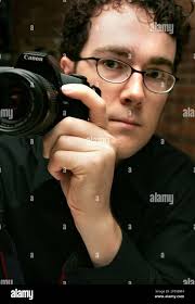 Greensboro photographer Philip Brubaker, seen Thursday, June 17, 2004, is  one of the artists included in the North Carolina Museum of Art's exhibit,  "Brushes with Life: Art, Artists and Mental Illnesses." The