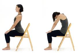Cat Cow In A Chair Sit Upright In Your Chair And Plant Both Feet Flat On The Floor Inhale Arch Your Back And D Chair Yoga Yoga For Seniors Chair