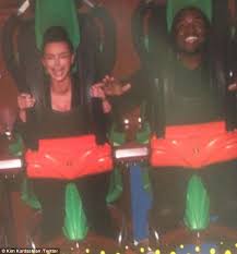 The two faces of rollercoasters! Kim Kardashian breaks down in tears